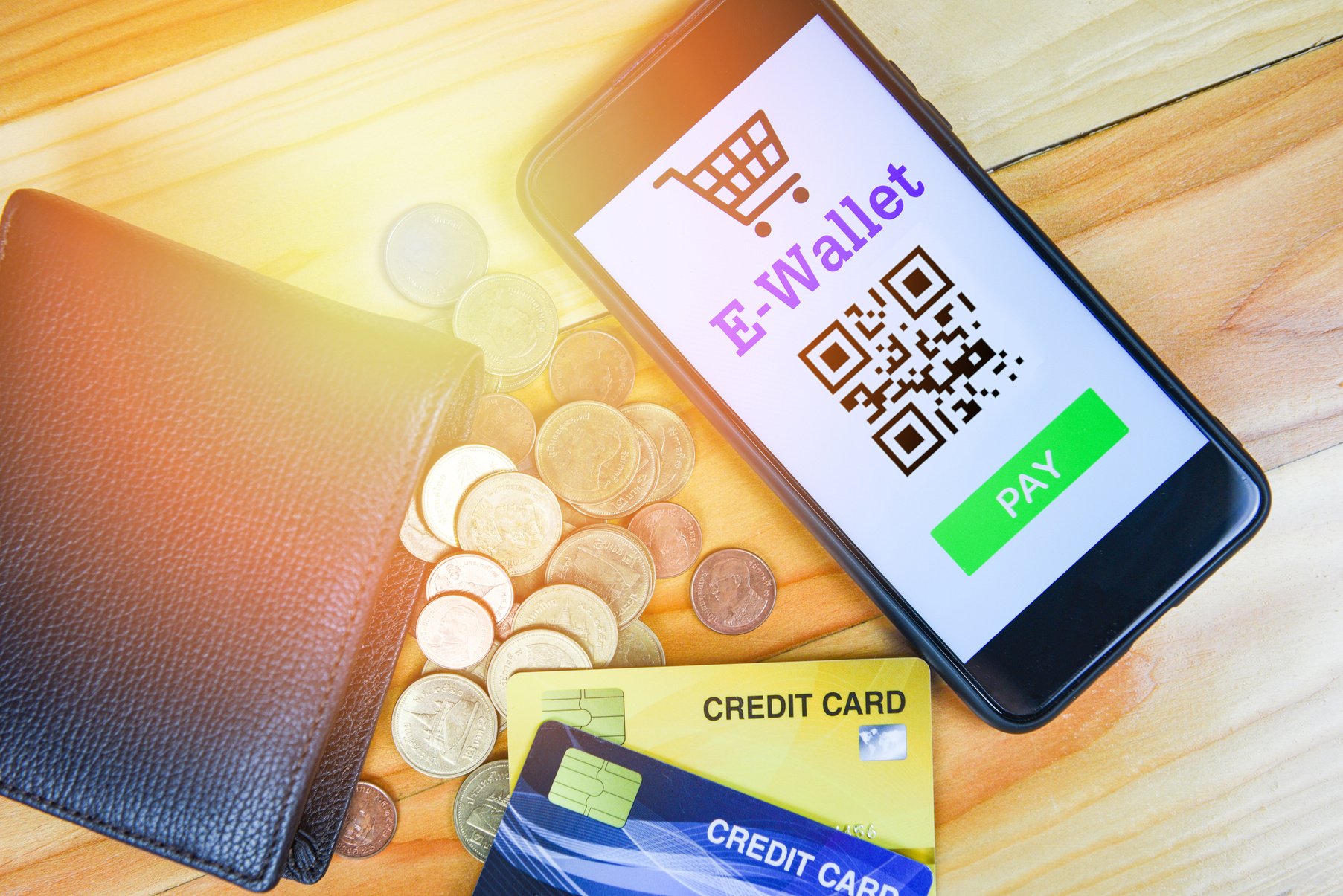 e wallet app on smartphone with credit card and coin in wallet technology pay - Mobile payment online shopping concept